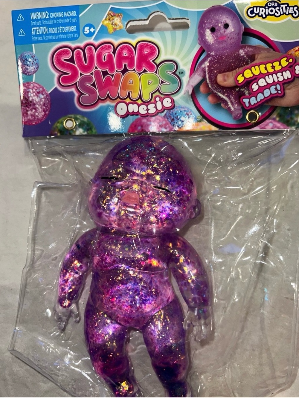 Sugar swaps Onesie Purple Glitter Squishy Kids Toy